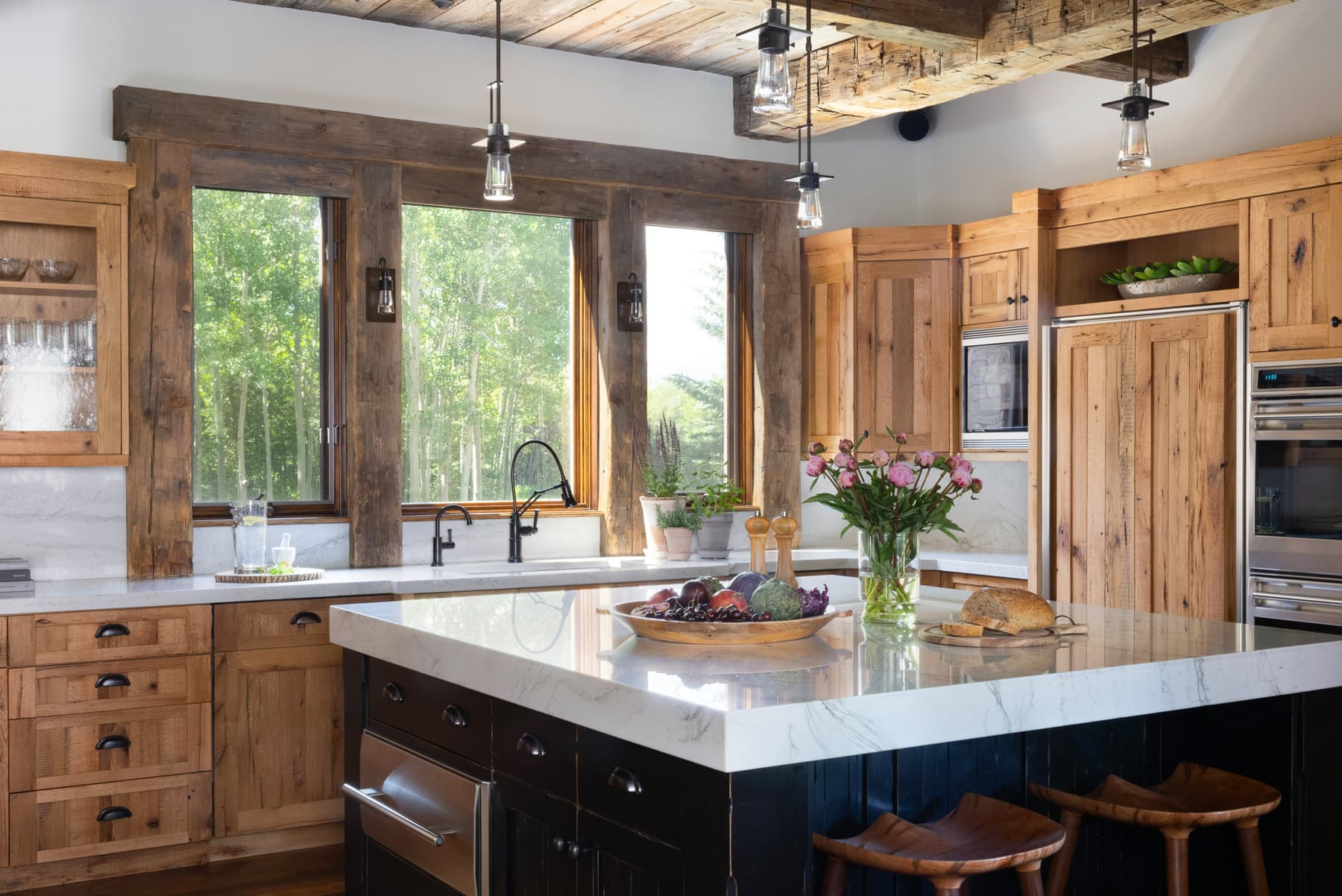 Beautiful Stonework and rustic details make the Light and Bright Interior Design Project by Nida Risto Interiors in Jackson Wyoming spectacular interior design. 