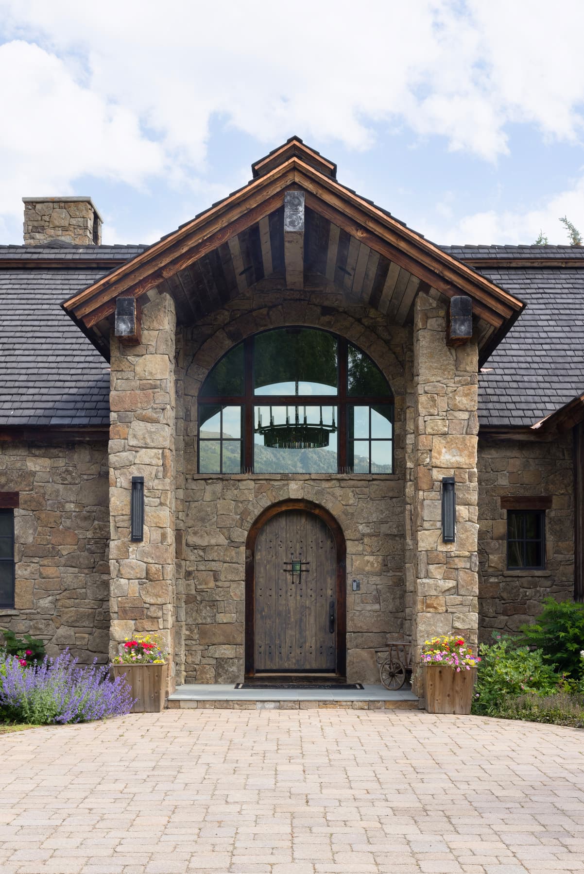 Beautiful Stonework and rustic details make the Light and Bright Interior Design Project by Nida Risto Interiors in Jackson Wyoming spectacular interior design. 