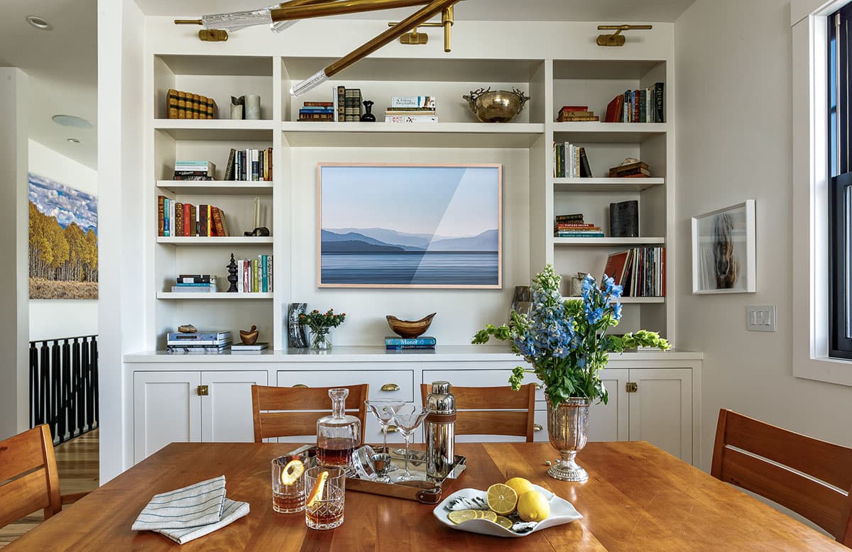 Dining room remodel in Jackson Wyoming with custom cabinets, antique elements and refined rustic interior desing. 